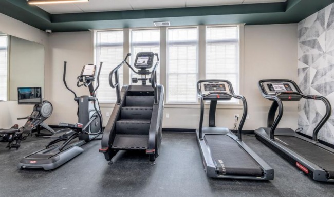 a gym with treadmills